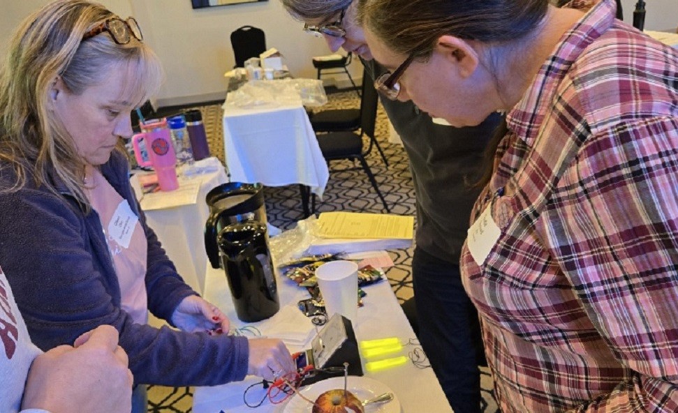 educator helping students