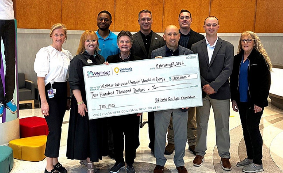 wellstar team holding check