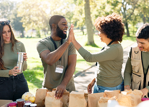 group of people with arms around each other