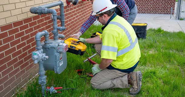 man working on meter